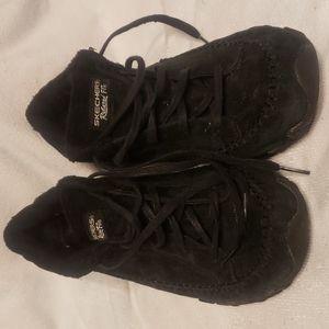 Skechers Relaxed Fit with memory foam.